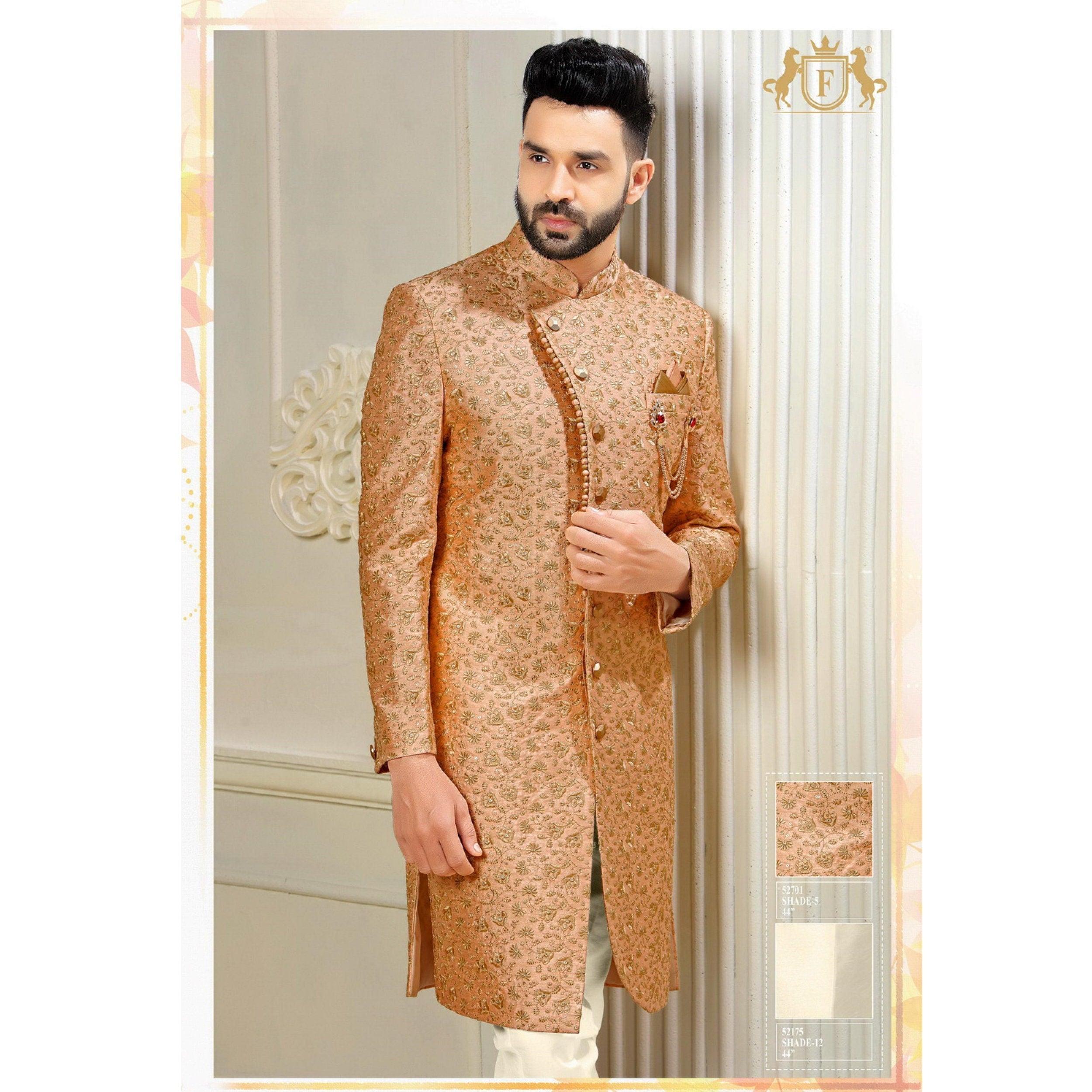 Elegant indian macho man model on suit and pink tie posed on winter day  Stock Photo - Alamy